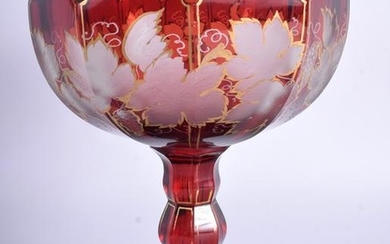 A 19TH CENTURY BOHEMIAN CRANBERRY GLASS COMPORT. 19 cm