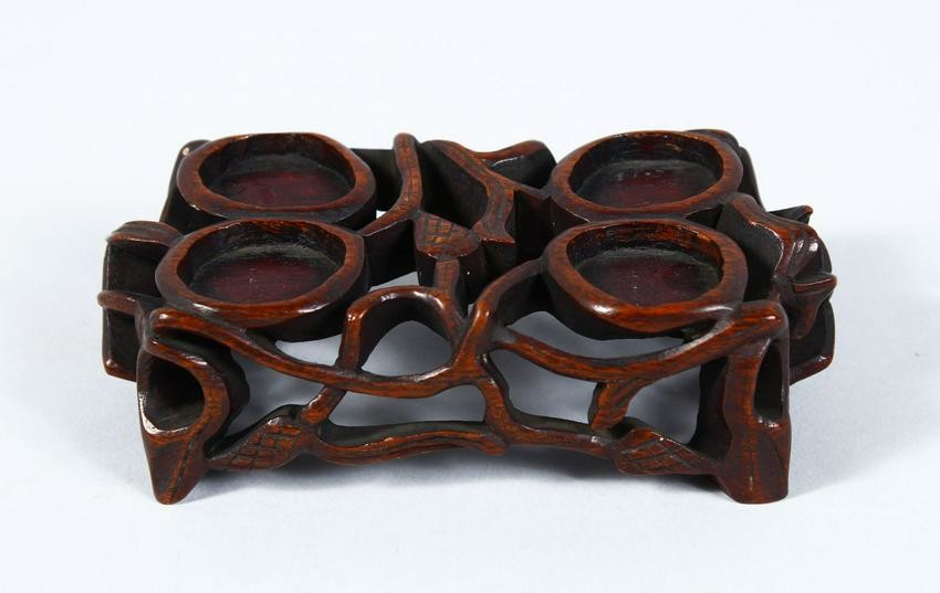 A 19TH CENTURY CHINESE CARVED HARDWOOD STAND, 4cm high