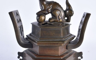 A 19TH CENTURY JAPANESE MEIJI PERIOD TWIN HANDLED BRONZE CENSER AND COVER. 19 cm x 12 cm.