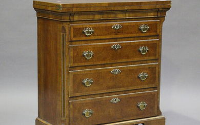 A 20th century George I style walnut bachelor's chest, fitted with a fold-over top and four cro