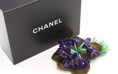 A BROOCH BY CHANEL