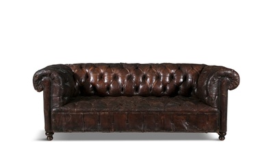 A BUTTONBACK BROWN LEATHER CHESTERFIELD SOFA of traditiona...