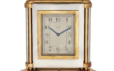 A Breguet brass and silvered desk clock, second quarter 20th century, the dial signed BREGUET 4789, 16cm high Please note that Roseberys do not guarantee working order or time keeping of any automatic, mechanical, quartz or other timepiece.
