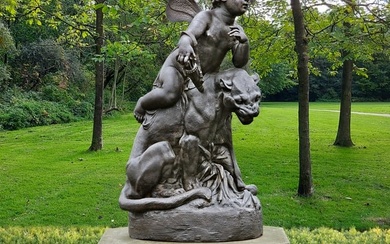 A CAST-IRON GROUP REPRESENTING EROS SEATED ON A PANTHER IN THE MANNER OF GIOVANNI MARIA BENZONI