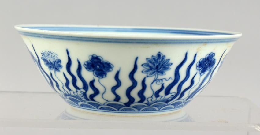 A CHINESE BLUE AND WHITE BOWL. Six character mark.