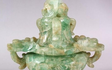 A CHINESE CARVED GREEN QUARTZ TWIN HANDLE VASE AND