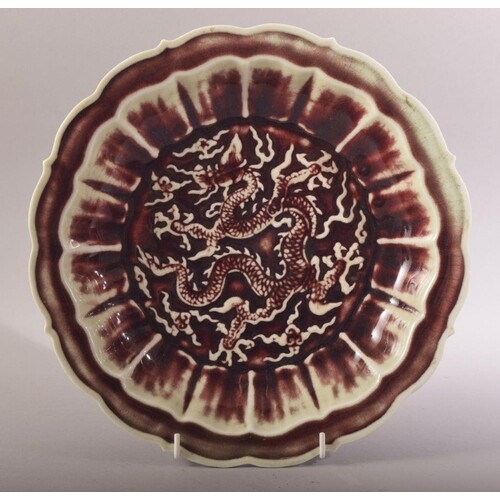 A CHINESE OX BLOOD / FLAMBE MING STYLE PORCELAIN DRAGON DIS...