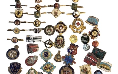 A COLLECTION OF VINTAGE GILT METAL AND ENAMEL BADGES To incl...