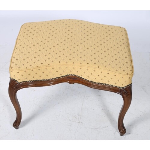 A CONTINENTAL WALNUT AND UPHOLSTERED STOOL the serpentine se...
