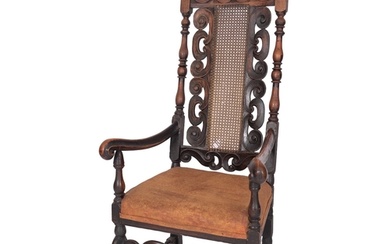 A Charles II carved walnut and canework elbow chair, circa 1...