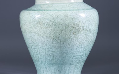 A Chinese Celadon Jar, the body and shoulder with...