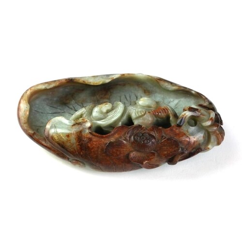 A Chinese Jade Sculpture with organic form decoration of a p...