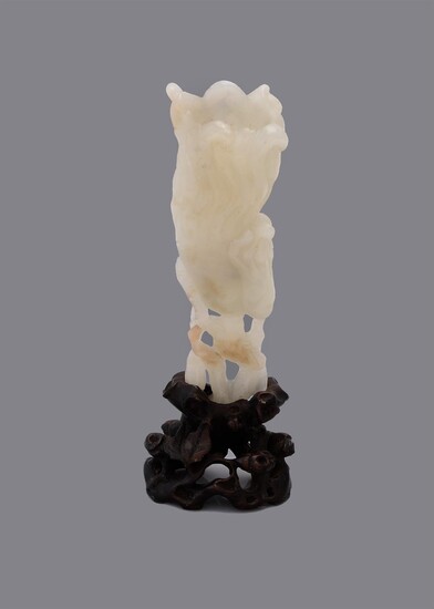 A Chinese white or pale green jade 'Finger citrus' carving