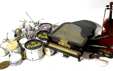 A Collection of Toy Musical Instruments including Piano