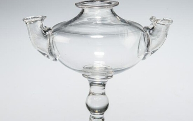 A DOUBLE-SPOUT GLASS OIL LAMP, CIRCA 1790