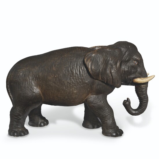 A FRENCH PAINTED TERRACOTTA FIGURE OF AN INDIAN ELEPHANT
