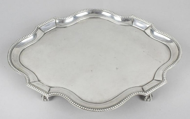 A George III silver teapot stand, of oval serpentine