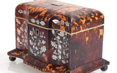 A Georgian tortoise-shell, mother-of-pearl inlaid and ivory mounted caddy of...