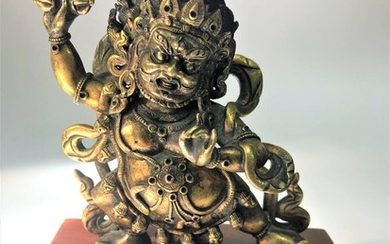 A Gilt Bronze Figure of Vajrapani.