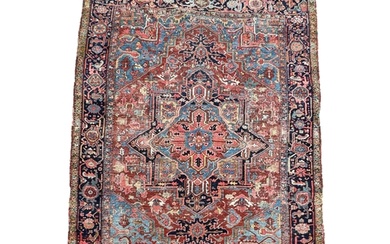 A Heriz carpet, North West Persia, circa 1900 336cm x 248cm...