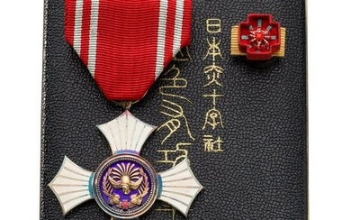 A Japanese Red Cross silver medal for women in box