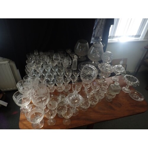 A LARGE COLLECTION OF GLASSWARE n including five glasses on ...