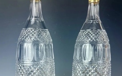 A LARGE PAIR OF EMPIRE STYLE DORE BRONZE MOUNTED BACCARAT LIQUOR BOTTLES