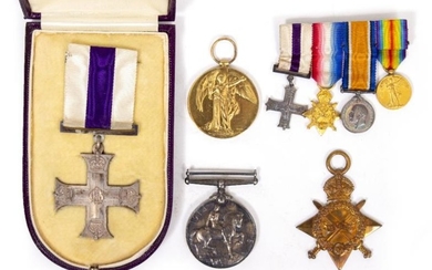 A MILITARY CROSS (MC) in original box and related...
