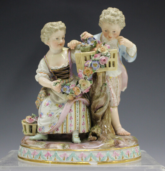 A Meissen figure group emblematic of Spring, late 19th century, modelled after Schönheit as a b