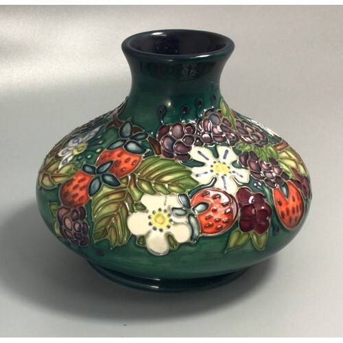 A Moorcroft pottery vase of compressed globular form with fl...
