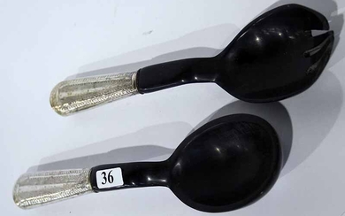 A PAIR OF EBONY AND SILVER SALAD SERVERS