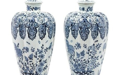 A Pair of Delft Covered Vases
