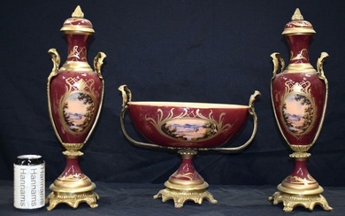 A Porcelain French style Ormolu mounted centre piece set largest 46 cm.(3)
