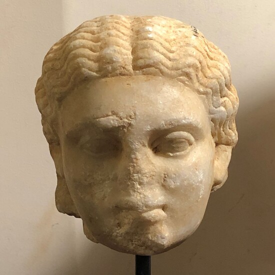 A ROMAN MARBLE HEAD OF A LADY