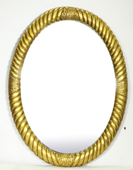 A Rococo style giltwood oval mirror with a rope or