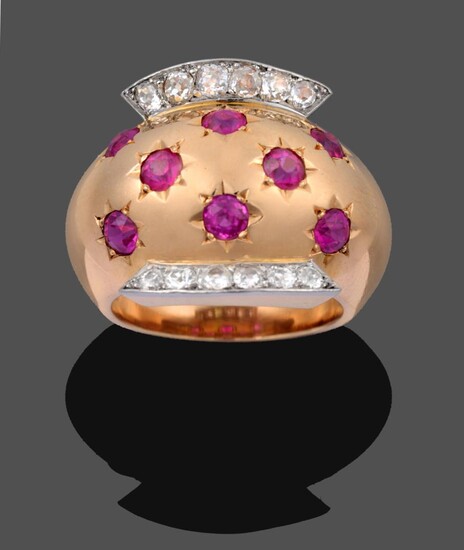 A Ruby and Diamond Ring, by Van Cleef & Arpels, eight old cut rubies in yellow star settings,...