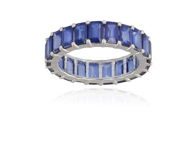 A SAPPHIRE ETERNITY RING Composed of a continuous...