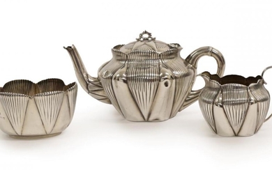 A Three-Piece Victorian and Edward VII Silver Tea-Service, by J....