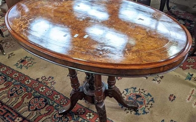 A VICTORIAN WALNUT OCCASIONAL TABLE