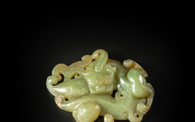 A celadon and russet jade carving of qilin, Ming dynasty...