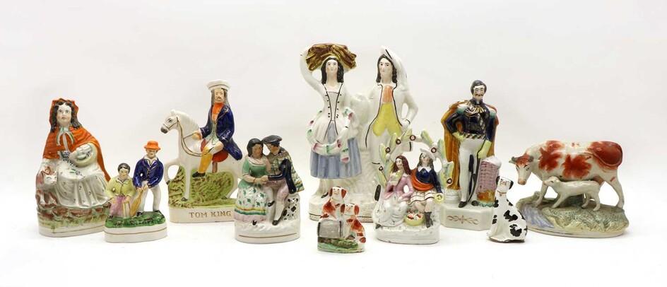 A collection of Staffordshire figure groups