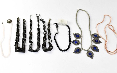 A collection of costume jewellery, to include angel, tiger and...
