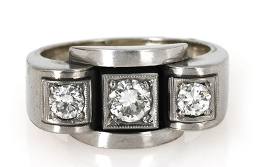 A diamond ring set with three brilliant-cut diamonds weighing a total of...