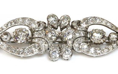 A diamond set bar brooch