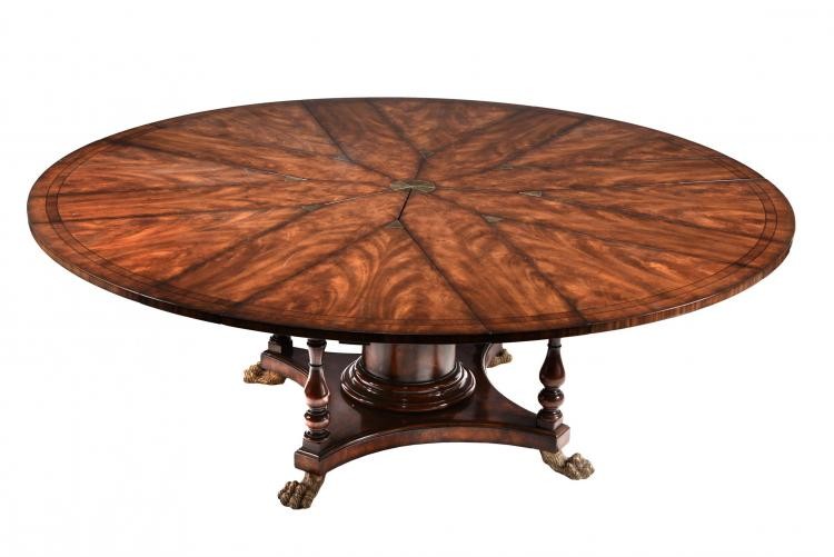 A flame mahogany extending dining table in William IV style