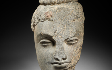 A gray schist head of Buddha, Gandhara, circa 3rd century