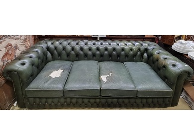 A large three seater Chesterfield Sofa with green upholstery...