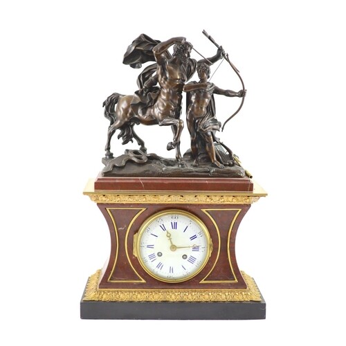 A late 19th century French bronze mounted rouge marble mante...
