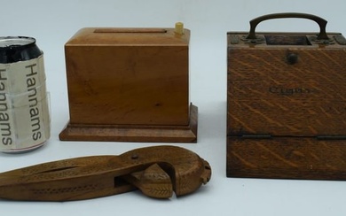 A mid Century oak and brass cigarette box together with a Satinwood cigarette dispenser and a carved