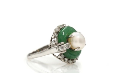 A nephrite, pearl and diamond ring set with polished nephrite, freshwater pearl...
